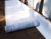 High performance composite sheet membrane that features a locking fleece to one side and a polymer hydrophilic coating to the other, as well as gas barrier capabilities.