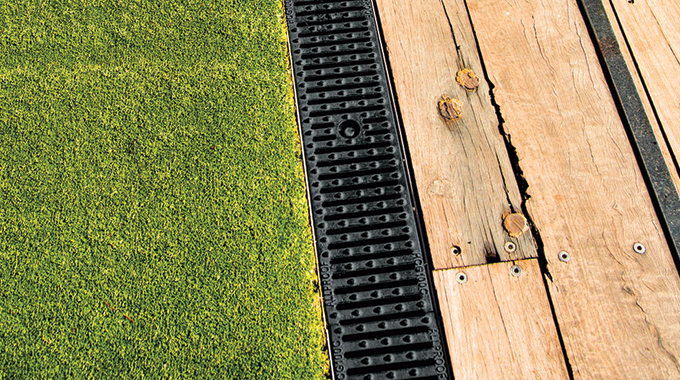 Polymer Concrete channel with cast Iron grate at Ponsonby Central Auckland.