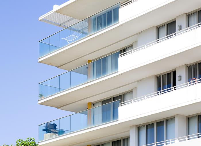 Frameless glass balustrade with side mounted channel system.