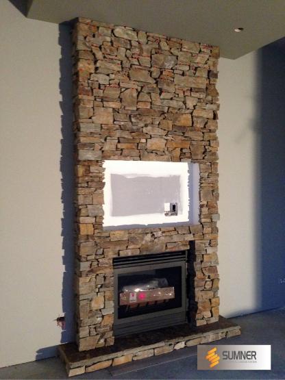 SUMNER Otago Brown Schist interior fireplace.