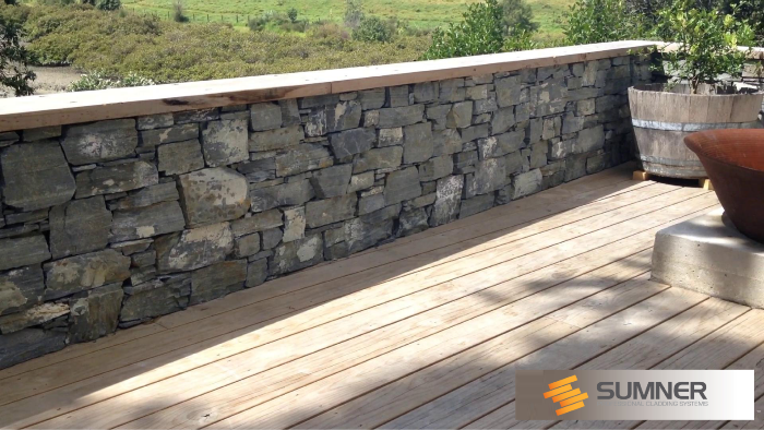 Installation of schist veneer to an informal seating area, Auckland.