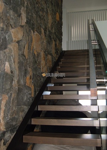 Bluestone feature wall beside stairs