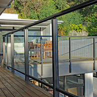 Edge fully framed glass balustrade with top and bottom rail, face fixed
