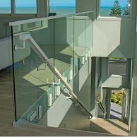 Edgetec JH Clamp frameless glass balustrade on an stairway