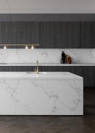 A unique marble quartz, its classical white base coloured in the purest of hues.
Introducing Empira White™