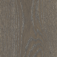 A deep, earthy mix of charcoal and muted brown tones, creating a grounded and natural palette. This timber flooring takes its cues from layered rock formations and the rich textures found.