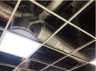 600 x 600mm ceiling grid installation for commercial premises.  Comes with seismic restraint strap.  Note 90 degree angles - allows horizontal installation.