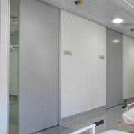 AutoCav Commercial cavity slider units with Alutec door panel in a hospital theatre