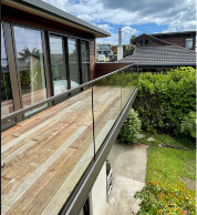 Floating aluminium frame on membrane deck with external gutter hidden in glass Vice Clearline balustrade.