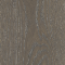 A deep, earthy mix of charcoal and muted brown tones, creating a grounded and natural palette. This timber flooring takes its cues from layered rock formations and the rich textures found.