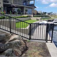 Homestead balustrade raking panels on a sloping fence line