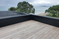 Floating aluminium frame on a membrane deck with internal drains.
Clearline Balustrade attached to nib wall with recessed fittings.