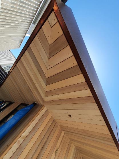 Custom dressed Western Red Cedar, vertical shiplap boards coated in WOCA White